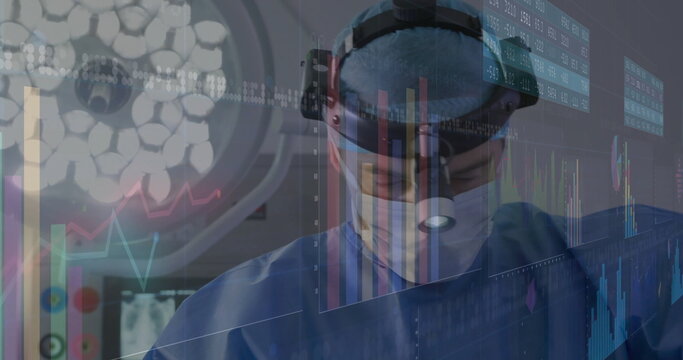 Monitoring vitals, surgeon in blue scrubs and mask in operating room, with digital data overlays