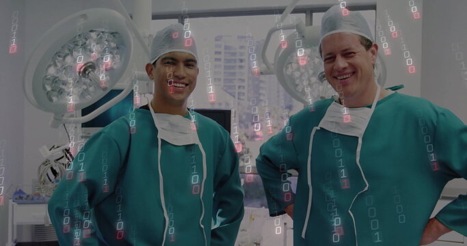 Standing two surgeons wearing green scrubs in operating room, showing LED lights and binary overlay - Powered by Adobe