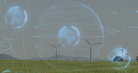 Hovering holographic globe projecting network lines and nodes over grassy field with wind turbines
