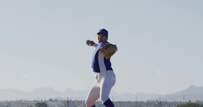 Pitching female baseball player winding arm with leather glove at baseball field, team jersey - Powered by Adobe