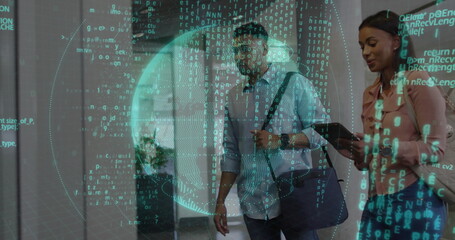 Walking coworkers wearing suits carrying tablet and bag through corridor with floating code sphere