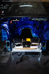 Preparing electronic control modules is crucial in a drift car project. Electronics and ECU Components for drift car project. Electronic components and ECUs are staged for drift car build.