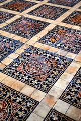 Elegant tiled floor in need of restoration