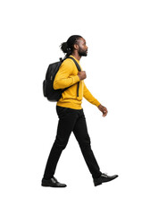 Naklejka premium Adult african american man with neat dreadlocks, yellow shirt, black pants, backpack, walking mid-stride on a pristine transparent background, no shadows, 3/4 view, professional studio shot,