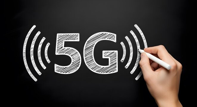 Hand draws 5G symbol with wifi waves on blackboard.