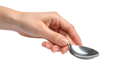 Female hand holding a spoon isolated on transparent or white background