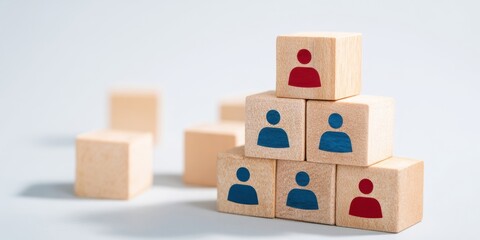 The stacked blocks representing teamwork and diversity in a professional environment.