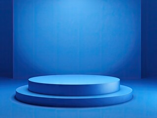 Two-tiered circular blue platform in a dimly lit blue room, creating a minimalist, empty display space