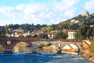 Obraz premium Ponte Pietra and Sanctuary of the Madonna of Lourdes in Verona, Italy 