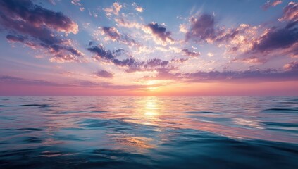 Fototapeta premium Vibrant sunset over a calm ocean, pastel hues painted across the sky and reflected on the water's surface