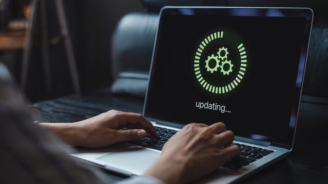 Software update installing on laptop screen for seamless tech experience in modern workspace