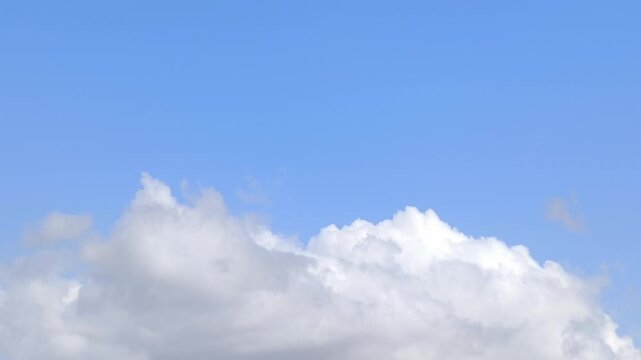 Cumulonimus clods moving in the afternoon