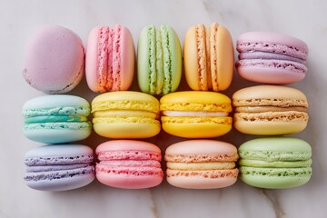 Fototapeta premium Colorful Macarons on Marble Surface in Pastel Palette