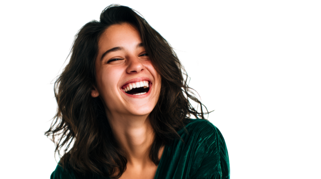 Joyful Young Woman Laughing with Eyes Closed Wearing Green Velvet Top