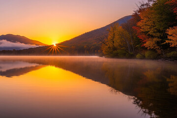 Fototapeta premium autumn sunrise over the lake in mountains