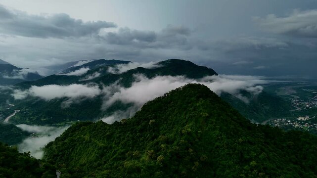 4k Aerial footage of Nainital Mountains in day time with white clouds in the sky