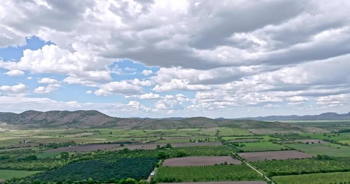 Apple orchards in the Sierra de Durango during a storm