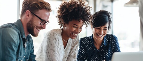 The joyful team collaborating on projects in a modern office setting.