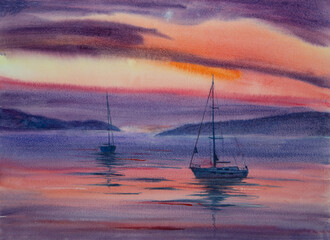 two yachts at sunset