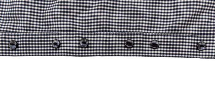 Part, piece of checkered shirt on white background. Shirt isolate