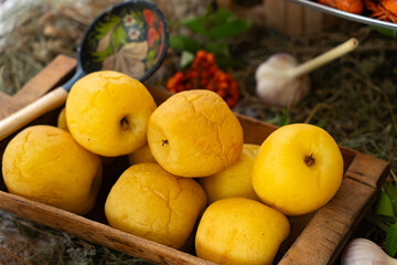 sliced bacon, onion, garlic, spices and cutlery, rustic table setting