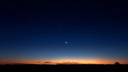 Naklejka premium Deep blue twilight sky with bright star over dark horizon night sky stars