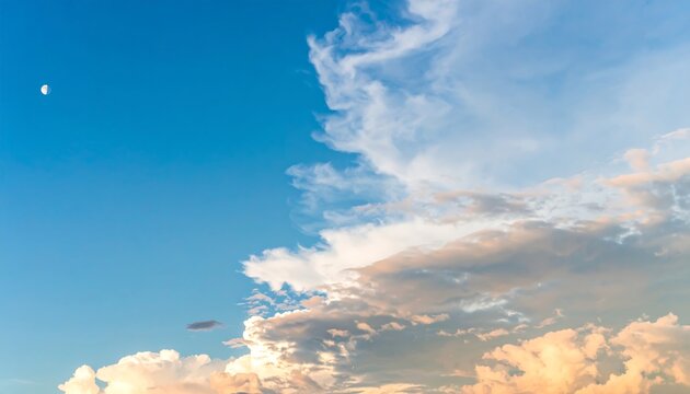 Pale clouds, blue sky, crescent moon