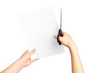 Female Hand Using Scissors to Cut Paper, angled view, isolated