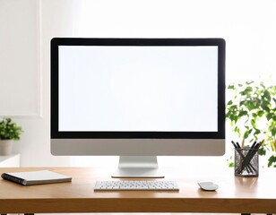 Modern computer with blank white screen on wooden desk