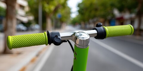 urban mobility gadgets, close-up of modern electric scooter handlebar with safety bell and grips, against blurred city street with no cars, in bright daylight