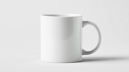 Fototapeta premium Minimalist White Coffee Mug Mockup on Isolated White Background