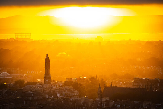 sunset over edinburgh over the firth of forth, view from calton hill, edinburgh, scotland