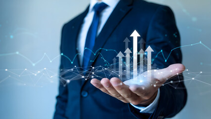 Professional business concept image showing a businessman holding a rising arrow graph and a futuristic network connection.