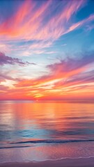 Fototapeta premium Vibrant sunset paints the sky with fiery oranges pinks and purples reflecting on calm ocean waters