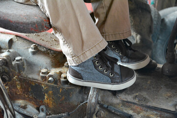 boots on the tractor