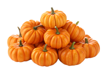 A pile of small orange pumpkins with green stems stacked on top of each other on black background