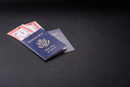 US passport or id document with tickets for flight, travel, border crossing. US passport and tickets - Powered by Adobe