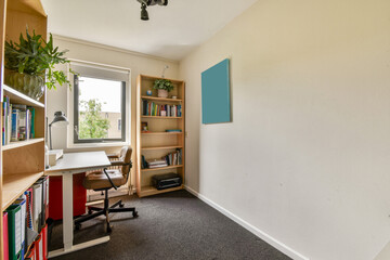 Minimalist home office with natural light and greenery