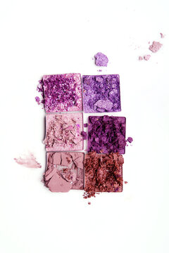 Crumbled eye shadow palette with various shades