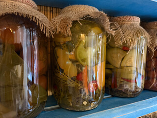 Jar of vegetable assortment on restaurant shelf