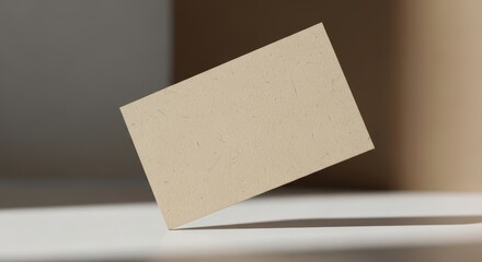 Minimalist Business Card Mockup with Natural Light and Shadow.