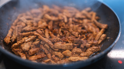 Tender pork strips stir-fried with Korean gochujang paste and caramelized onions. Spicy-sweet dish perfect for Asian cuisine content and food blogs