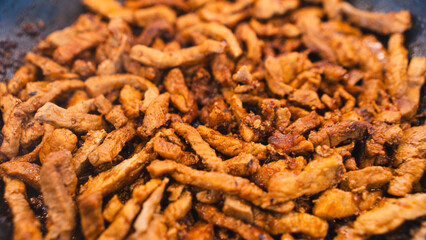Tender pork strips stir-fried with Korean gochujang paste and caramelized onions. Spicy-sweet dish perfect for Asian cuisine content and food blogs