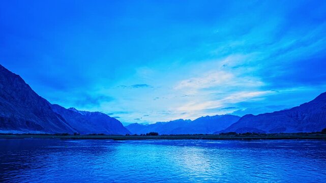 Nubra Valley, framed by the Karakoram Range, holds fertile ground with apples, apricots, and barley. The Nubra and Shyok Rivers flow past arid lands rich in seabuckthorn and stark mountain beauty.