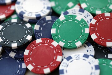Poker Table With Poker Chips Turns In Casino. Many Poker Chips Spins on the Table
