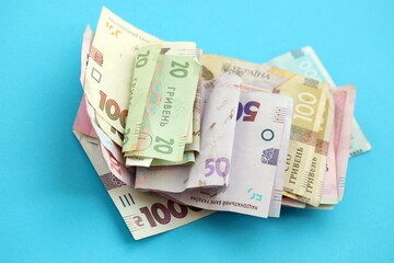Big amount of different Ukrainian hryvnia money bills. Pile of crumpled ukrainian banknotes