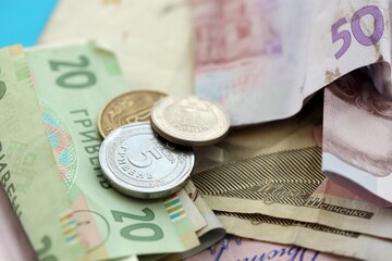 Big amount of different Ukrainian hryvnia money bills. Pile of crumpled ukrainian banknotes