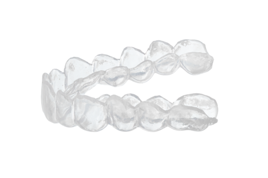 Transparent dental mouth guard for orthodontic treatment and bruxism prevention, clear plastic teeth aligner with detailed tooth impressions isolated on white background, professional closeup shot