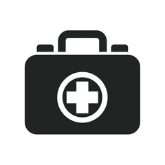 Obraz premium First aid kit icon. A minimal solid black silhouette of a medical suitcase with a circular emblem containing a white cross in the center, symbolizing emergency care and healthcare. 