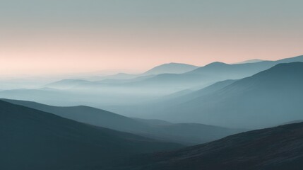 Fototapeta premium Layered distant hills with subtle early morning haze.